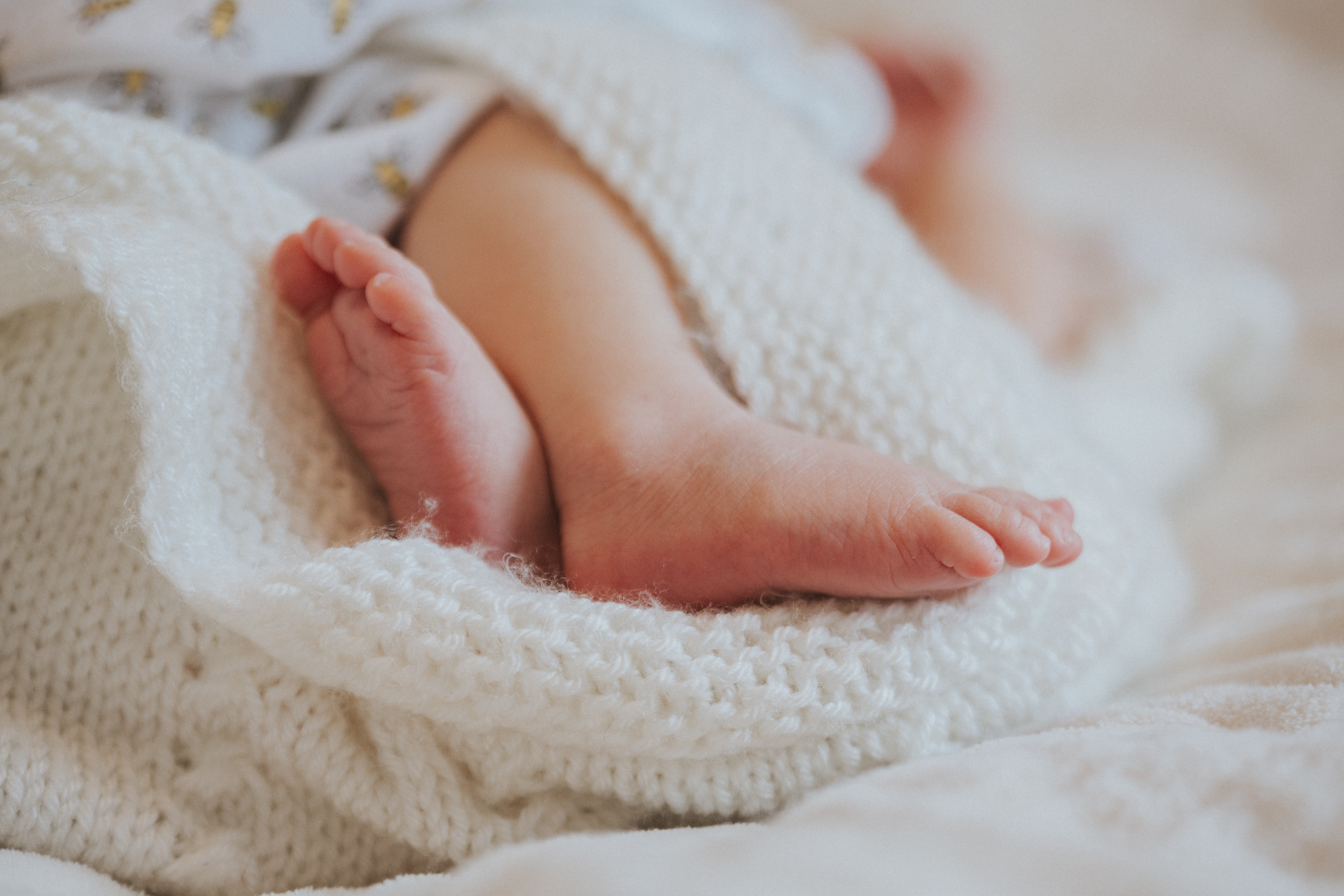 Happy mother embracing the beautiful chaos of family life